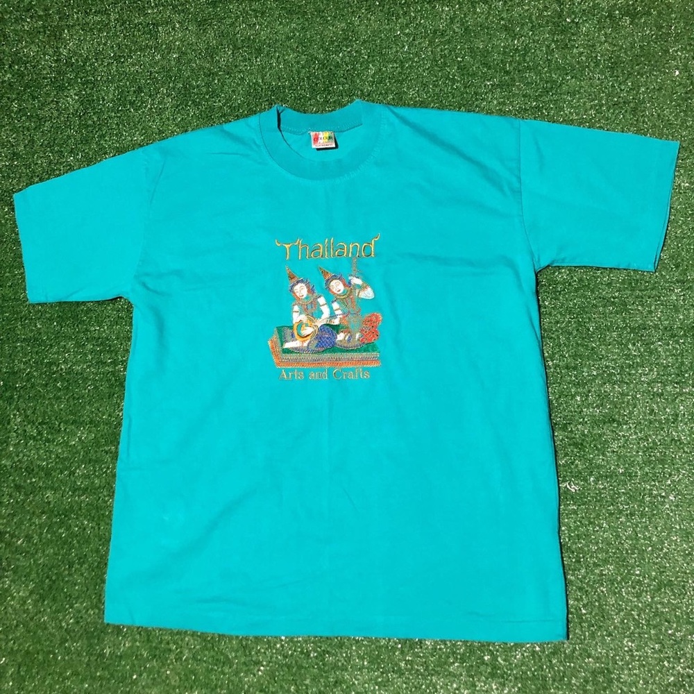 Vintage single stitch Thailand shirt w/ embroidered everything on front